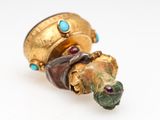 an image of a close up of a ring with a turtle on it