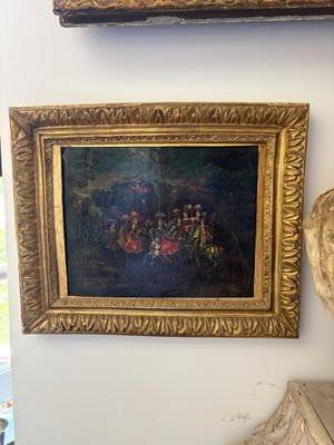 a painting on the wall next to a bust of a man