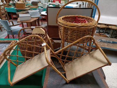 two wicker chairs sitting next to each other in a room