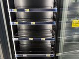 a refrigerator that has a lot of empty shelves in it