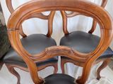 two chairs that are next to each other on a table
