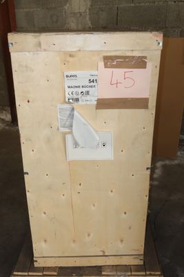 a wooden box that has some stickers on it