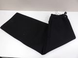 the pants are black and have a zipper at the bottom