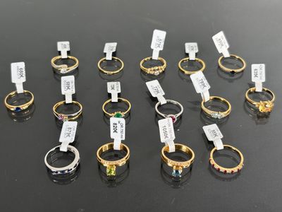a lot of different rings that are on a table