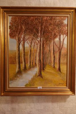 a painting hanging on the wall of a room