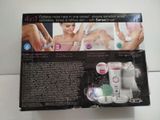 a box with a picture of a woman getting her nails done