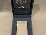 an image of a box with a silver metal object inside of it