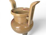 a brown vase with a handle on a white background
