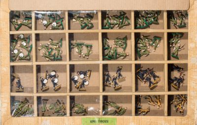 a display case with a lot of pins and screws in it