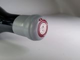 a bottle of wine that is sitting on a table