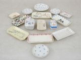 many different types of dishes and containers on the table
