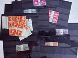 a lot of different stamps on the black envelope
