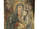 une peinture ancienne représentant une femme tenant un enfant dans ses bras