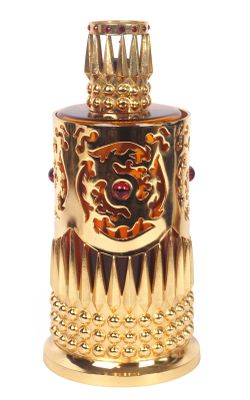 an image of a gold and red perfume bottle on a white background