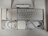 a box with a keyboard, mouse, and other electronics in it