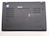 the back of a laptop with the bottom panel removed