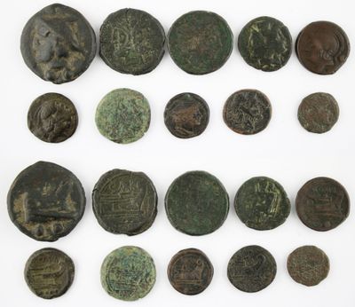 an assortment of ancient roman coins, including bronzes and bronzes