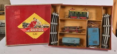 a box with a train set in it on a table
