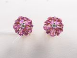 a pair of pink sapphire and diamond stud earrings