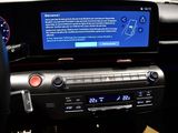 the dashboard of a car with a digital display in the center