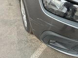 a close up of the front bumper of a car