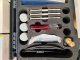 a case with tools in it sitting on a table
