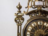 a clock that is sitting on top of a table