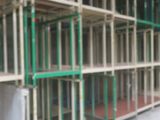 many shelves that are on the side of a building