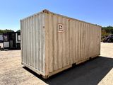 a white container sitting in the middle of a parking lot