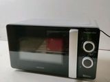 a toaster oven that is sitting on a table