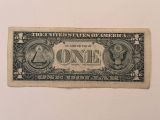 an old one dollar bill with a picture of president lincoln on it