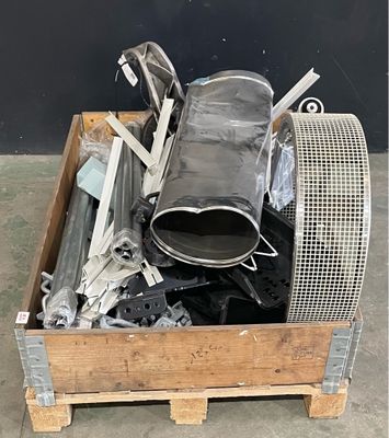 a wooden box with a bunch of metal items inside of it