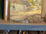 une photo d'un tableau posé sur une étagère dans un magasin