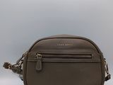 a brown cross body bag with a zipper on the front