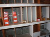 many boxes on the shelves in the room