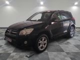 a picture of a black toyota rav parked on a checkered floor