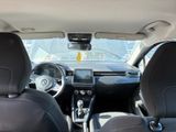 the interior of a car with black leather seats and steering controls