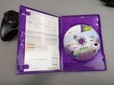 a purple case with a cd inside of it