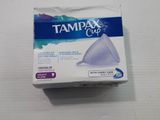 a close up of a box of tampox on a table