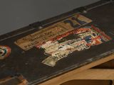 a piece of luggage sitting on top of a wooden table