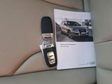 a picture of a car with a car key attached to it