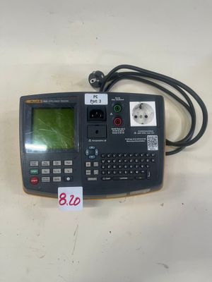 une image représentant un ordinateur de poche posé sur une table