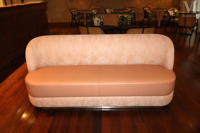 a couch that is sitting on a hard wood floor