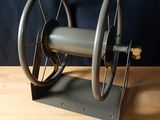 a small machine that is sitting on a wooden table