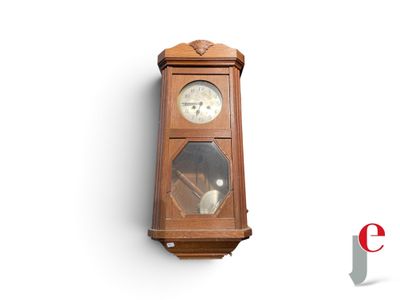 a clock that is hanging on the wall next to a clock