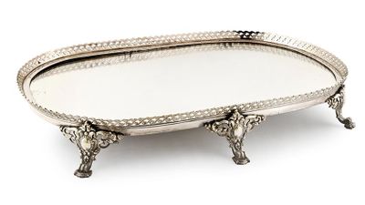 an oval silver tray with handles and handles on a stand