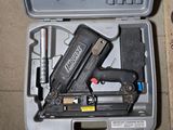 a box with a stapler and a stapler in it
