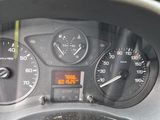 a close up of a car dashboard with a speedometer