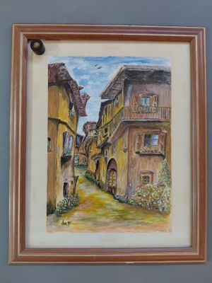 painting of a narrow street in an old town with a bird flying over it