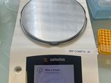 a scale that is sitting on a glass table